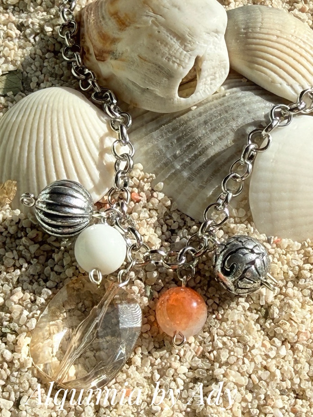 silver charm necklace with white jade orange and clear beads